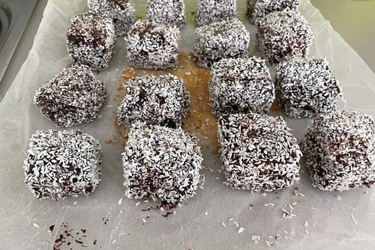16 lamingtons arranged in a square.